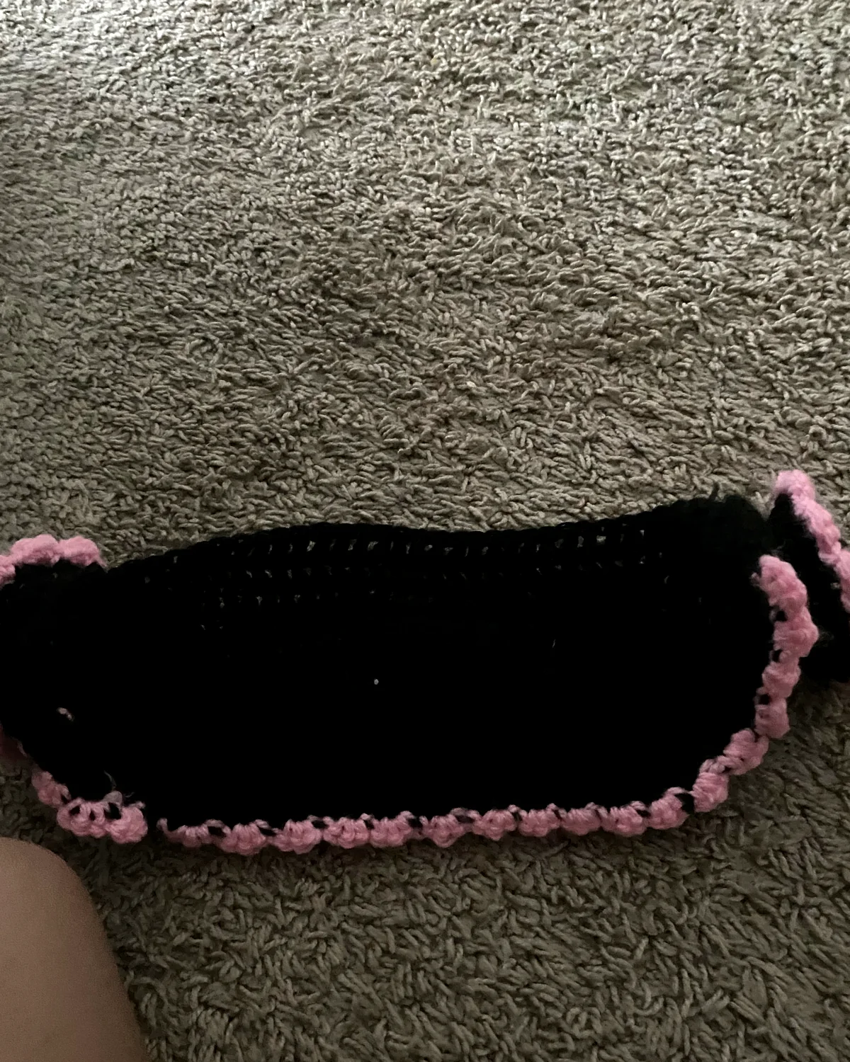 Black Bag with a Pink Ruffle